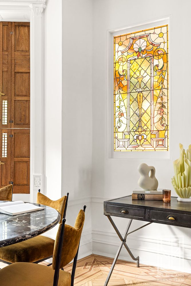 stained glass window with yellow and pink glass