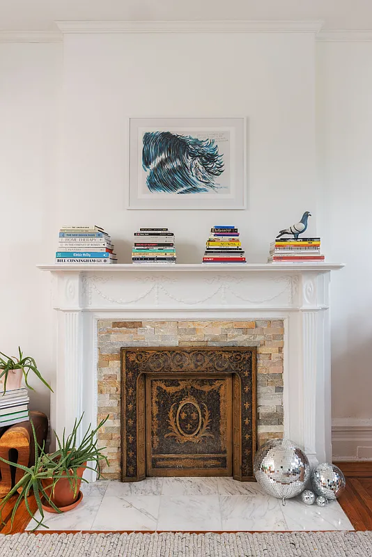 white mantel with modern hearth