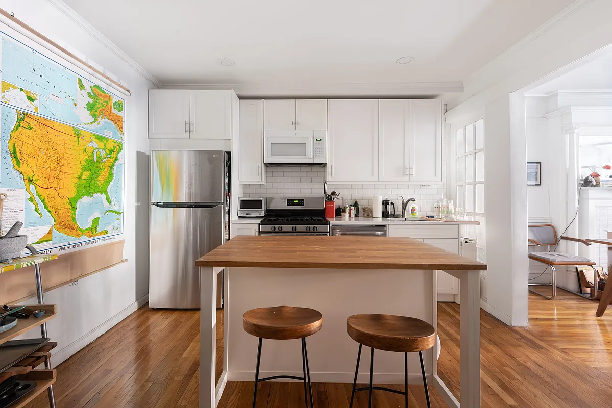 garden level kitchen with butcher block topped island