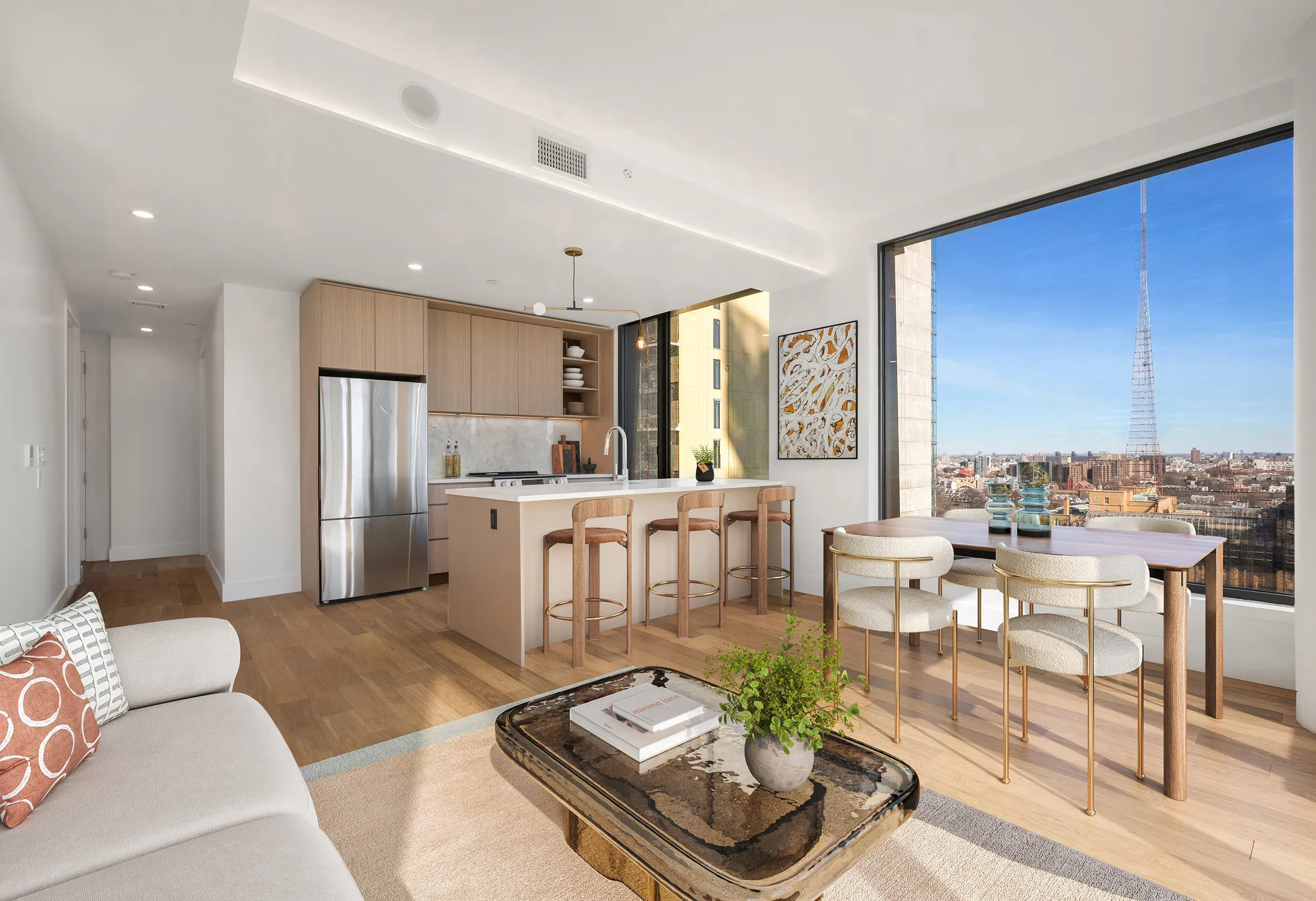 living room with open plan kitchen and large windows at 20 rockwell place