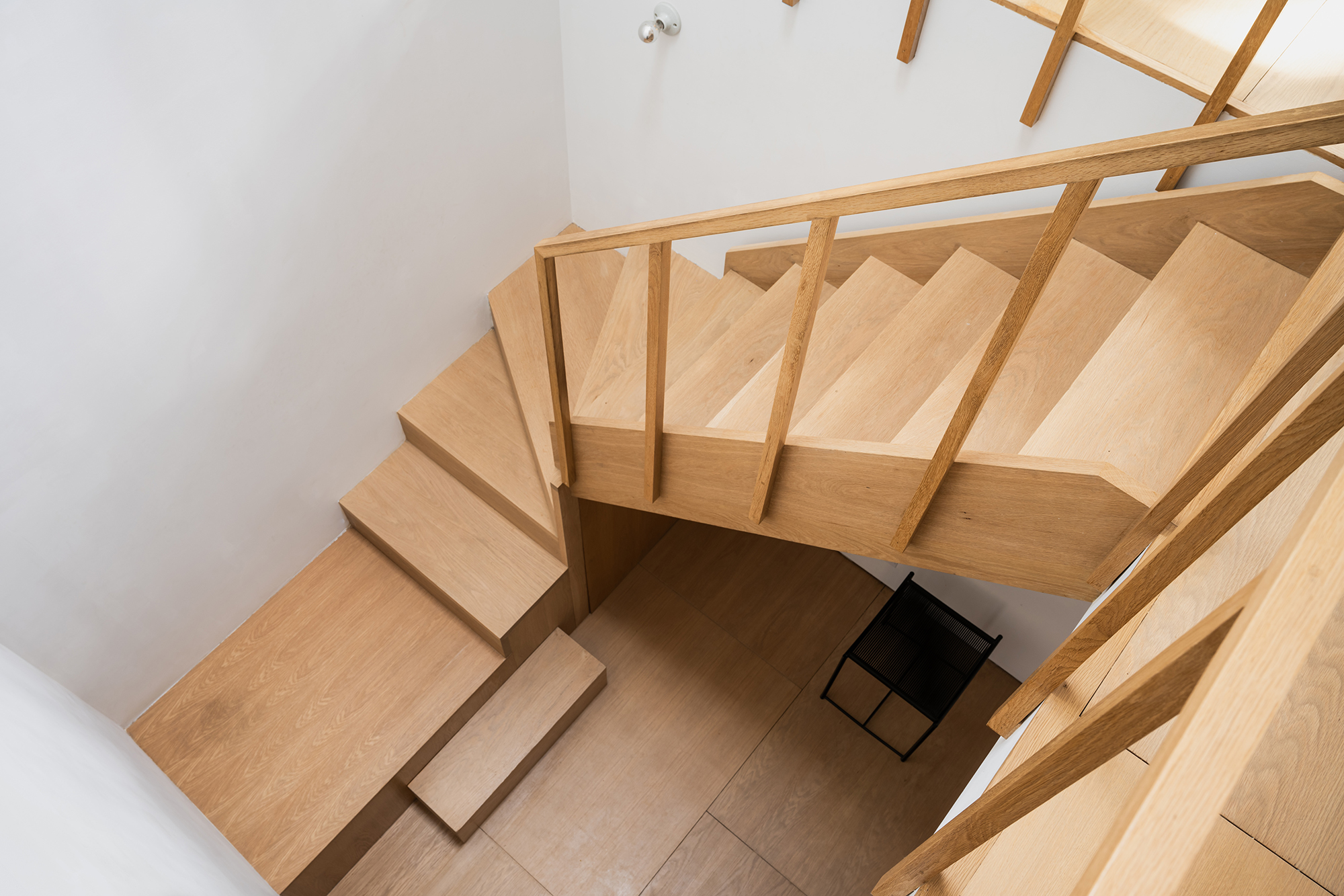 WOOD STAIRWELL FROM ABOVE