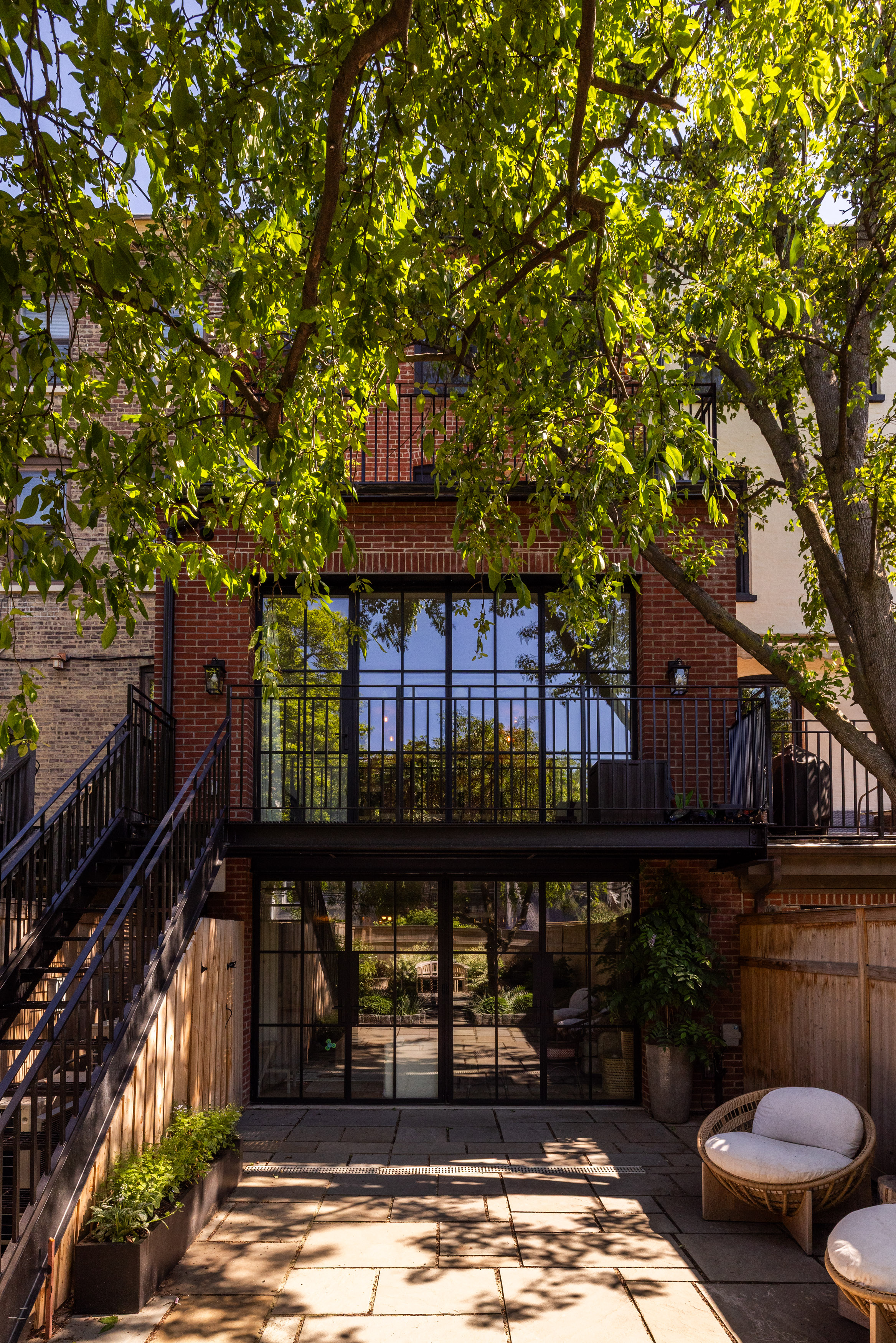 VIEW OF REAR FACADE FROM BACKYARD