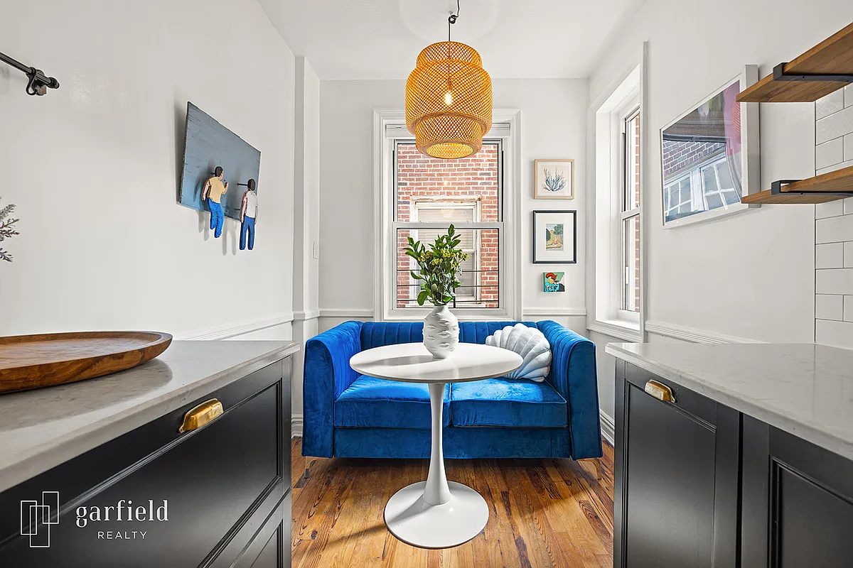 dining nook at rear of the kitchen with room for a love seat and small table