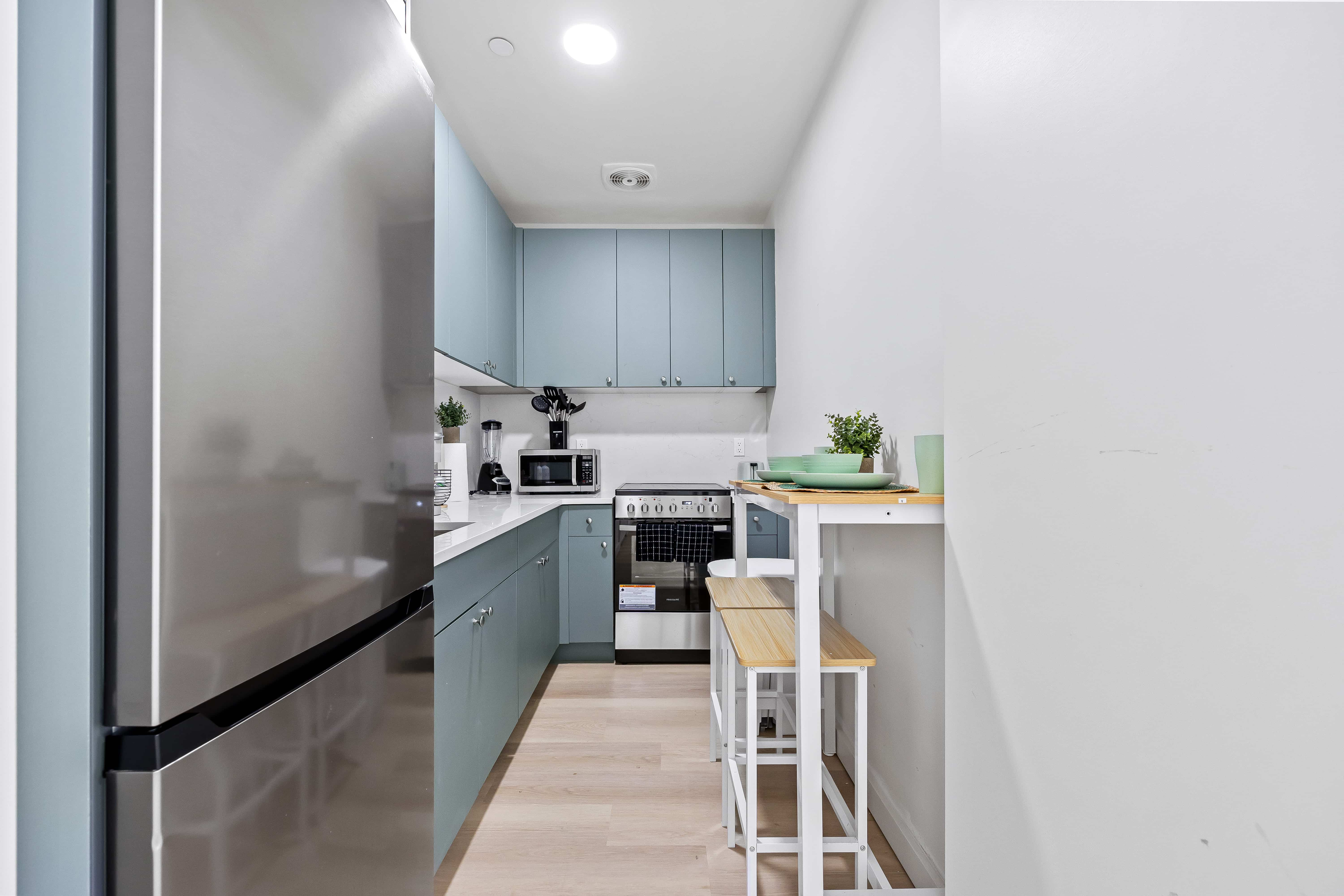 kitchen with blue cabinets