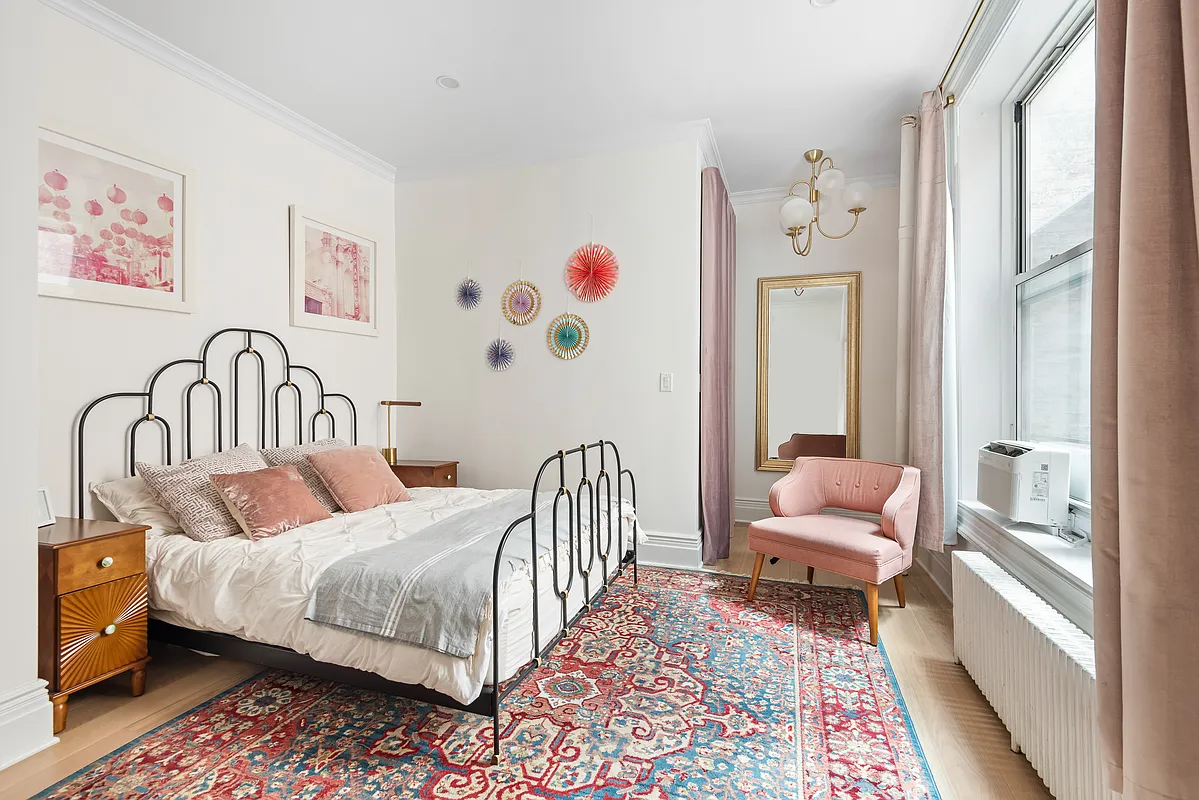 bedroom with room for a large bed and end tables