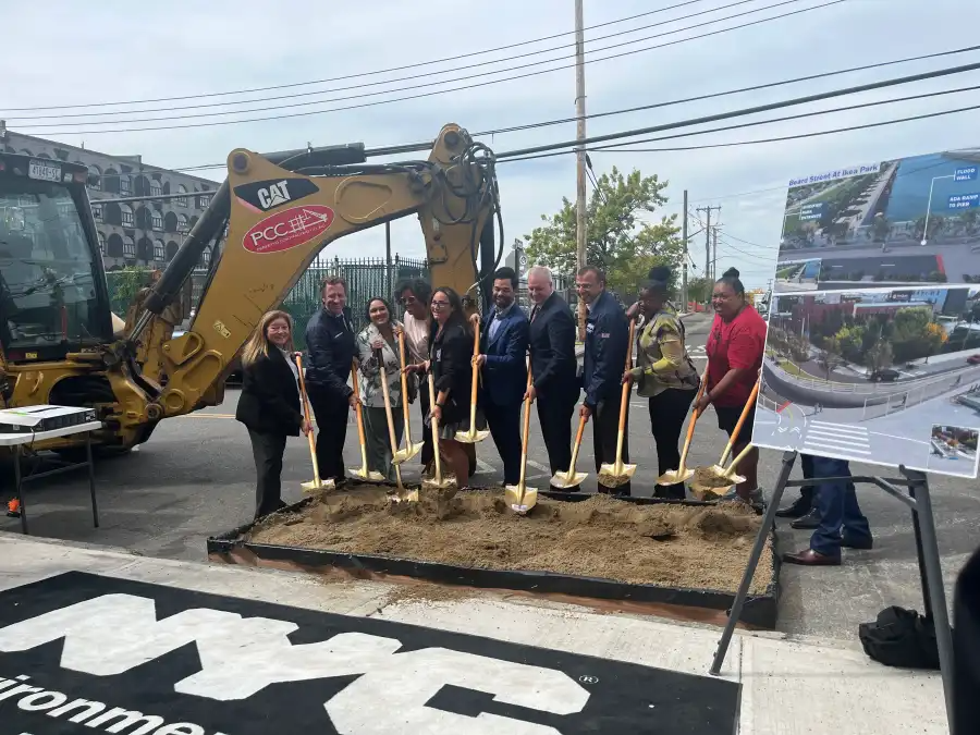 people with ceremonial shovels