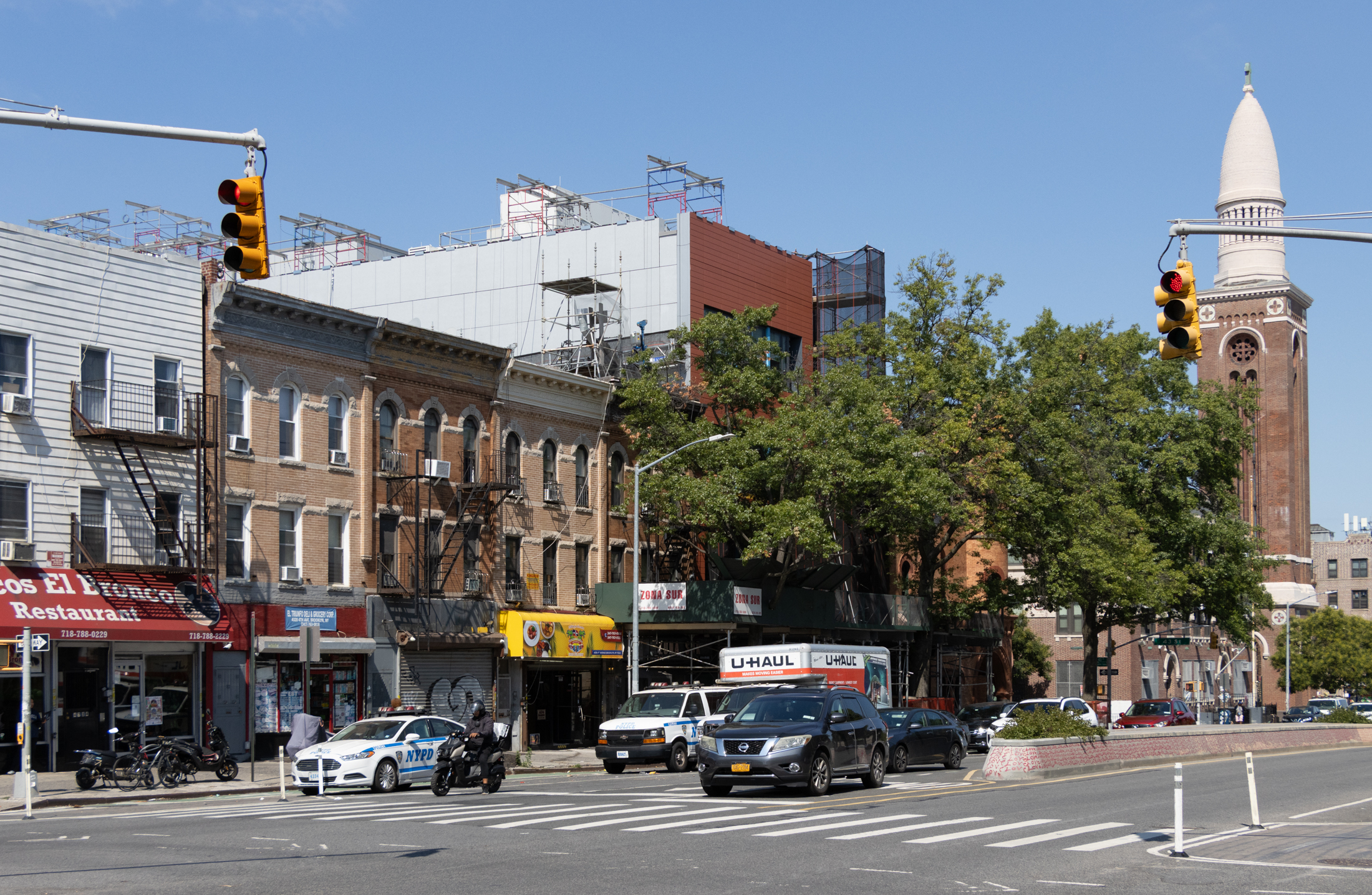 view of buildings along fourth avenue with scaffolding visible