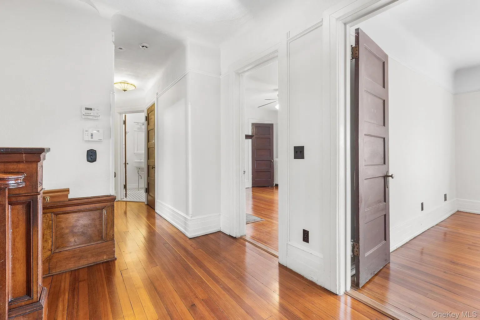 upstairs hall with wood floor