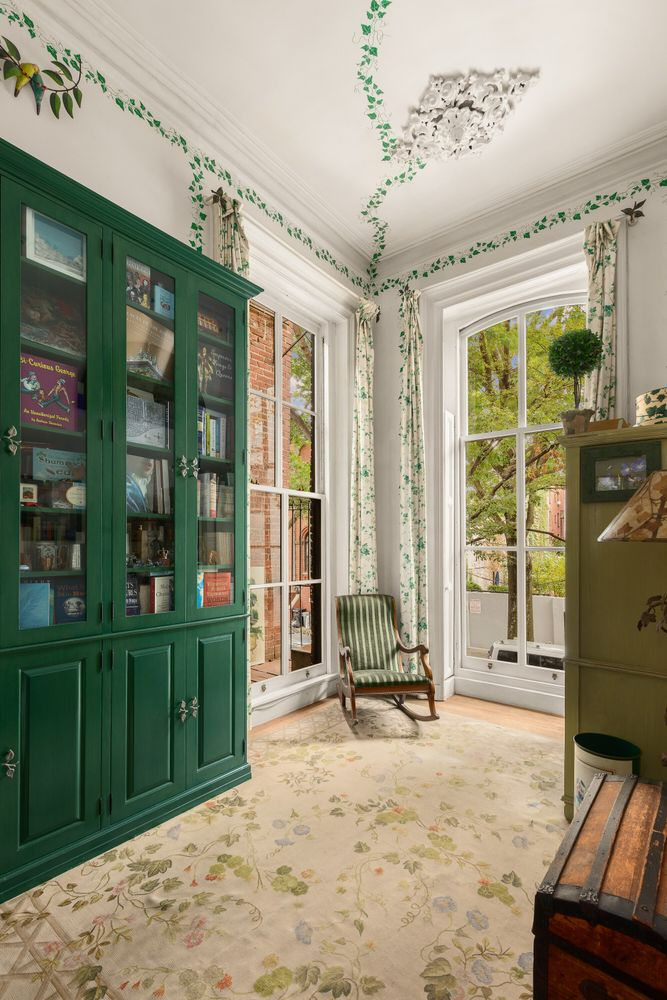 bedroom with two exposures and ivy stencil on walls and ceiling