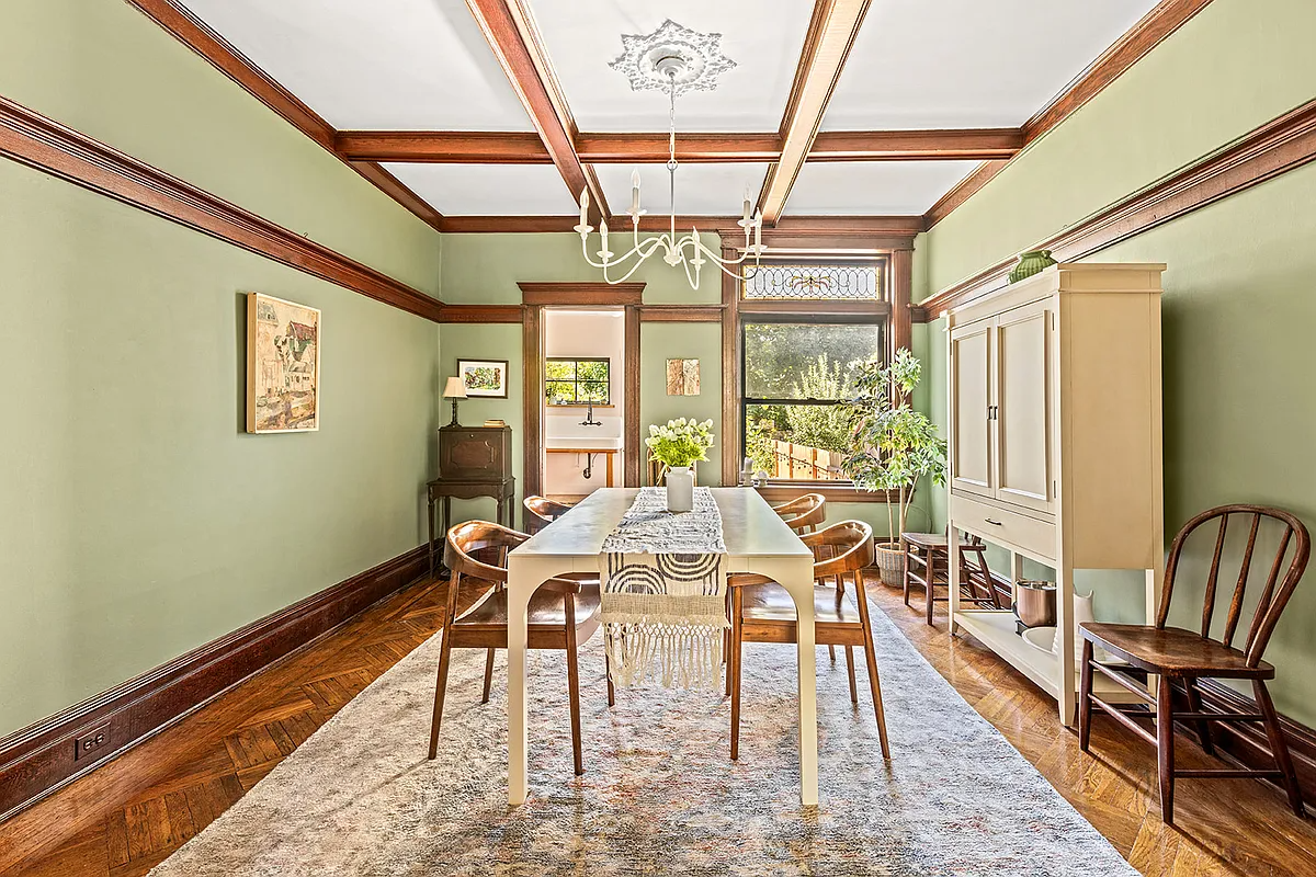 dining room with beamed ceiling