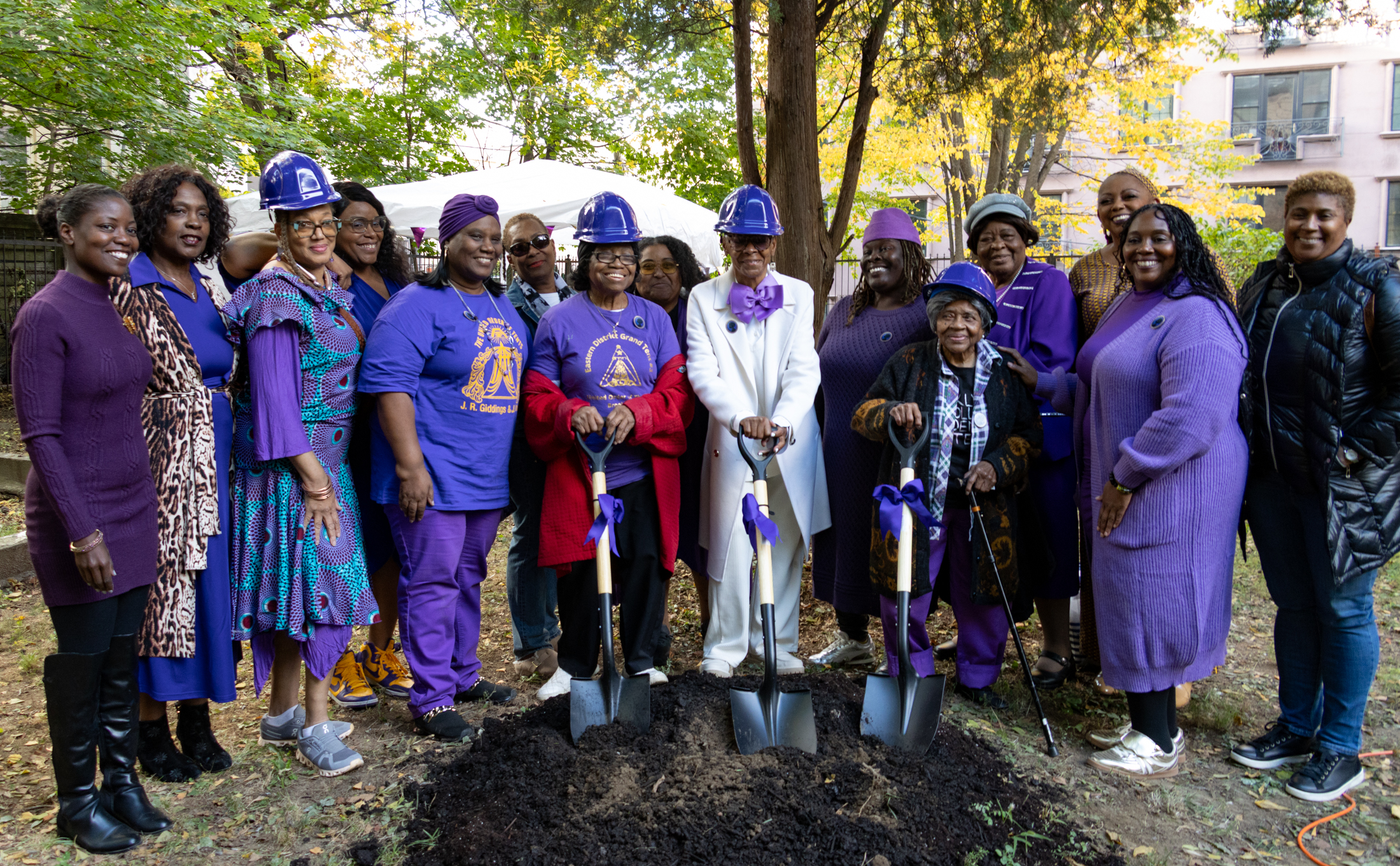 group with shovels and hardhats