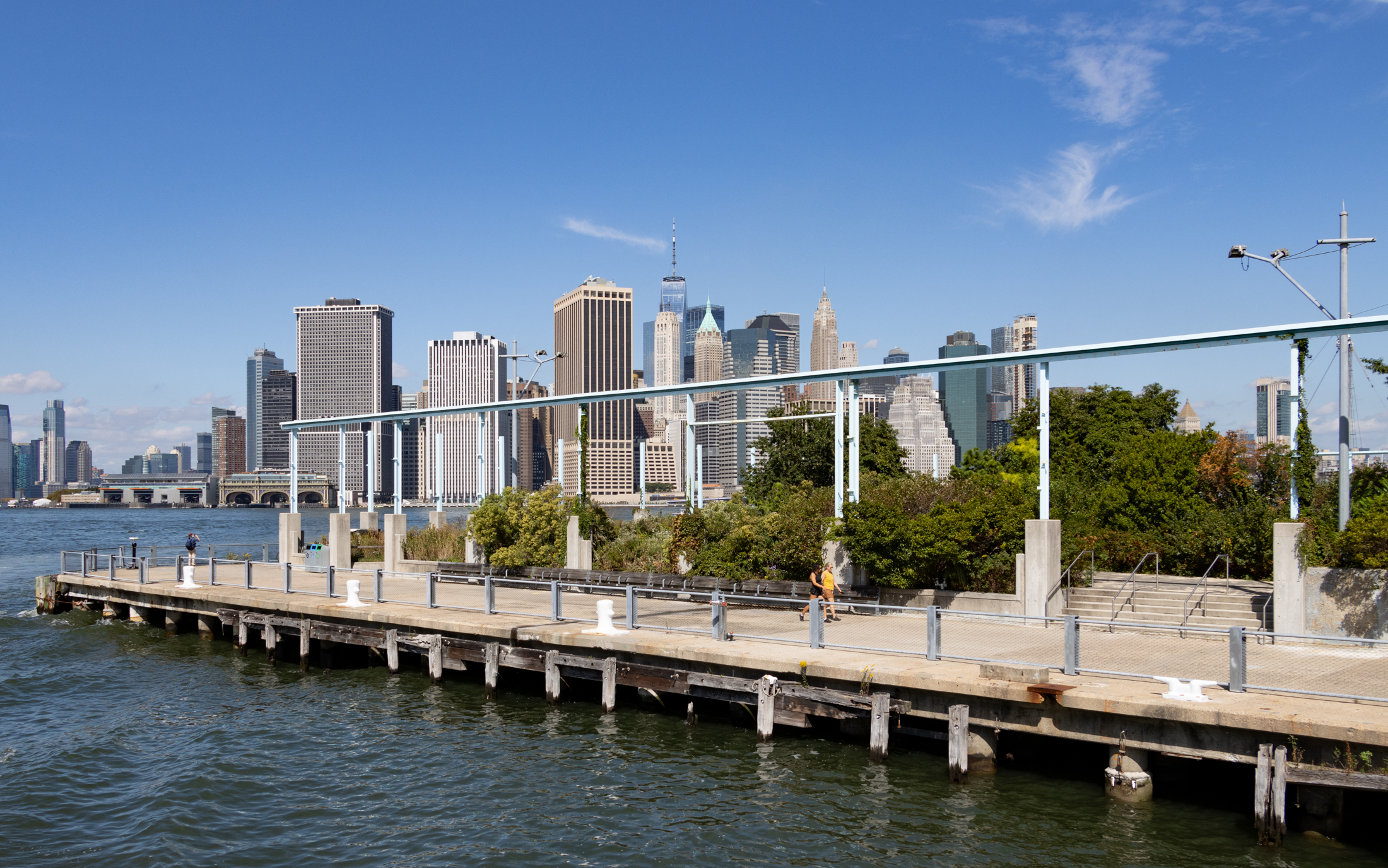 pier with the manhattan skyline in the distance