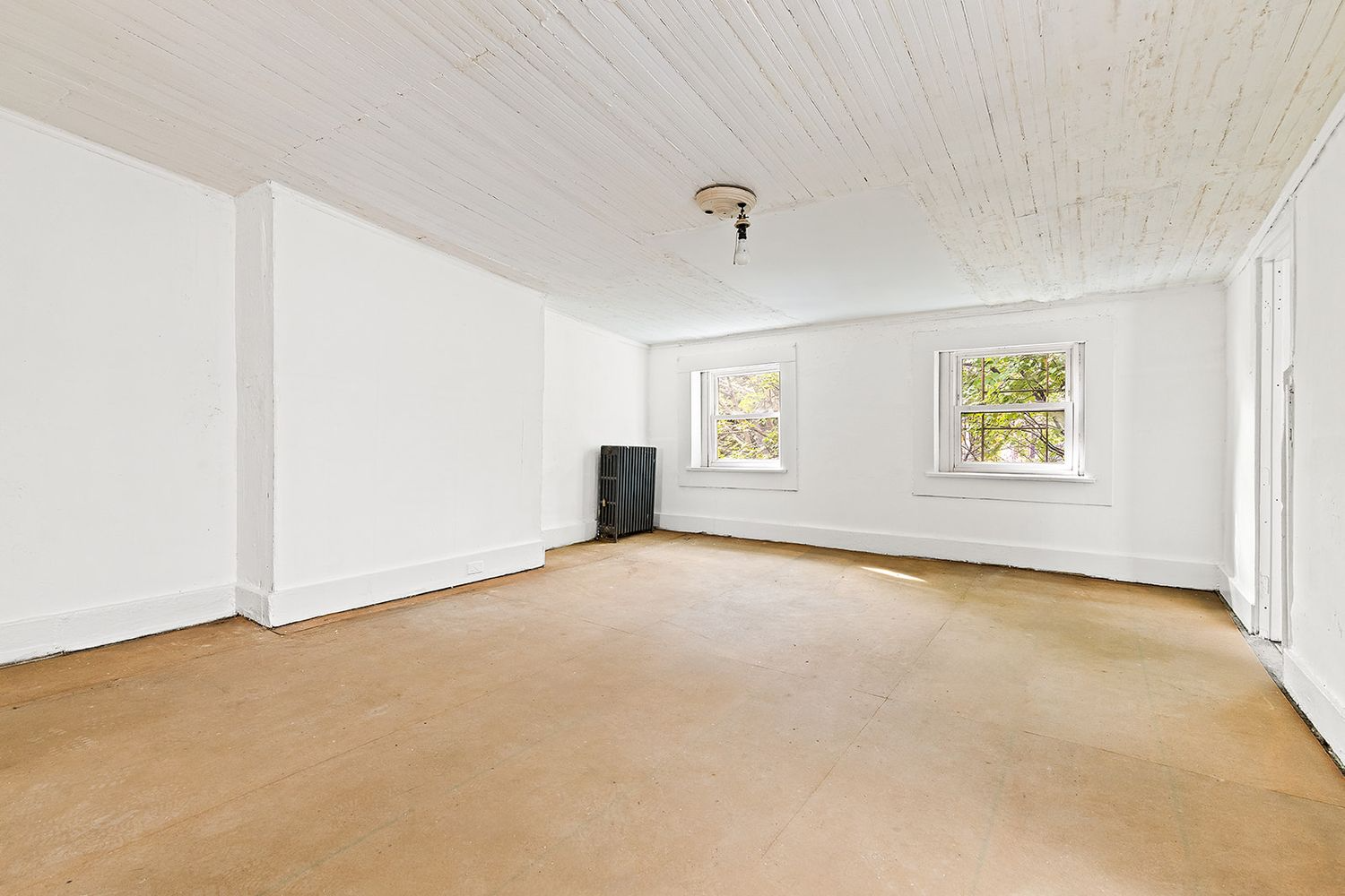 bedroom with wood slat ceiling