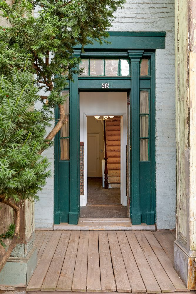 front door surround with pilasters and sidelights