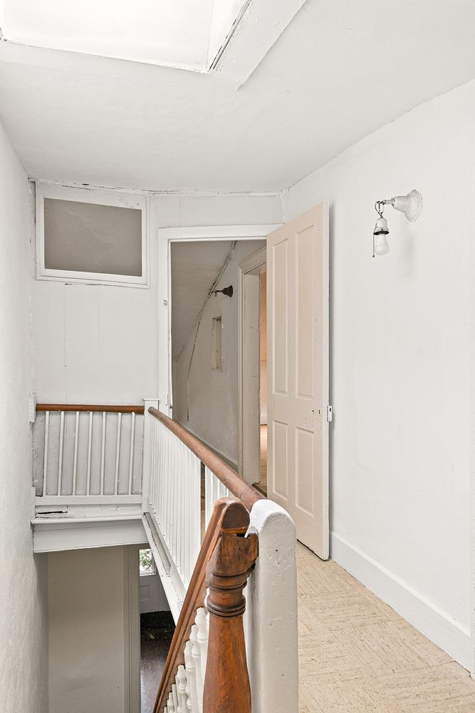 upstairs hall with linoleum floor