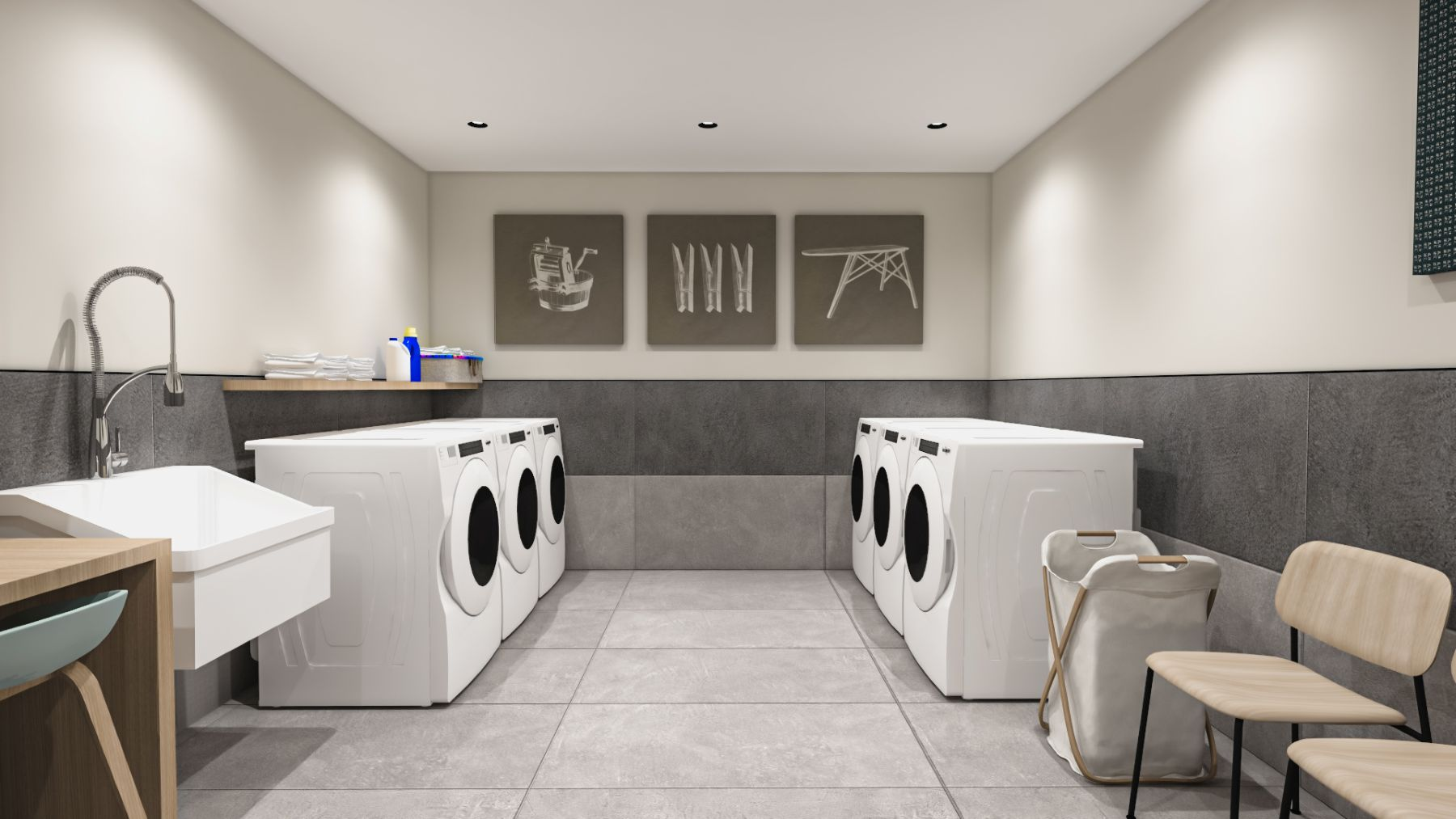 laundry room with utility sink and multiple machines