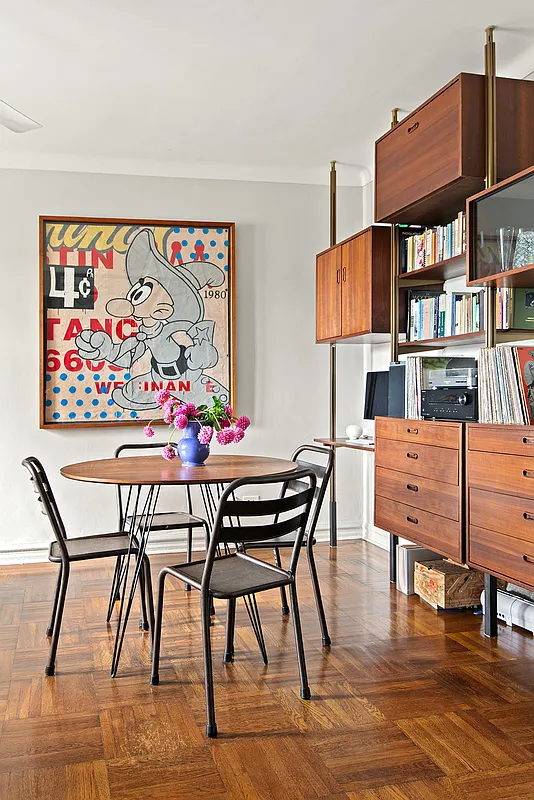 corner of living room with a dining table