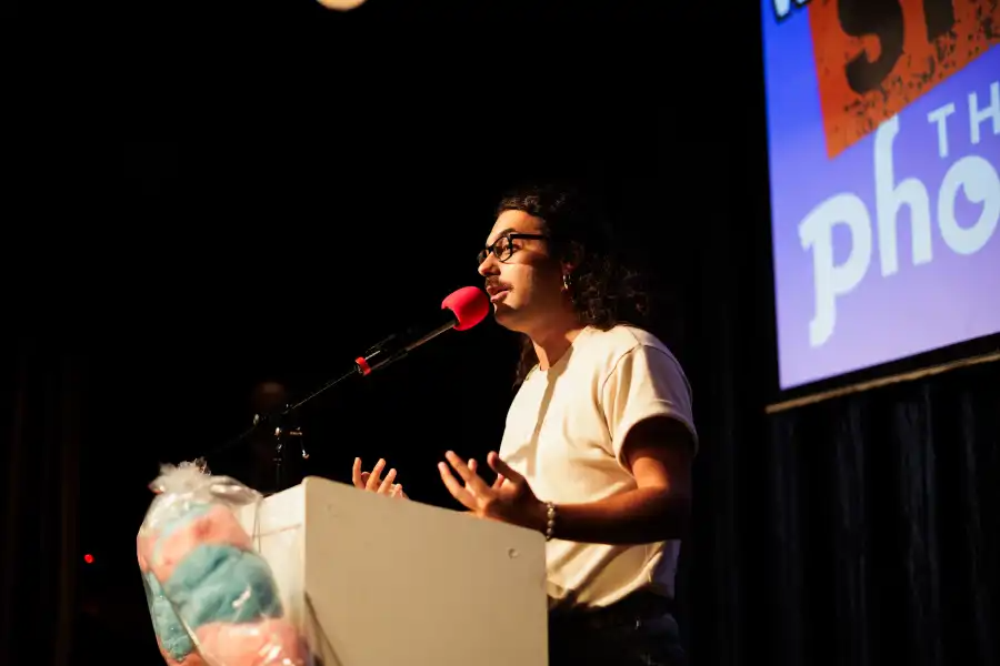 person speaking at a podium