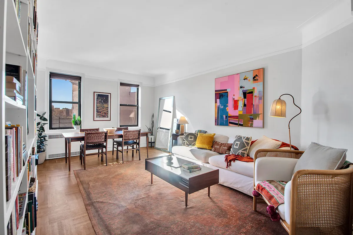 living room with wood floor, two windows