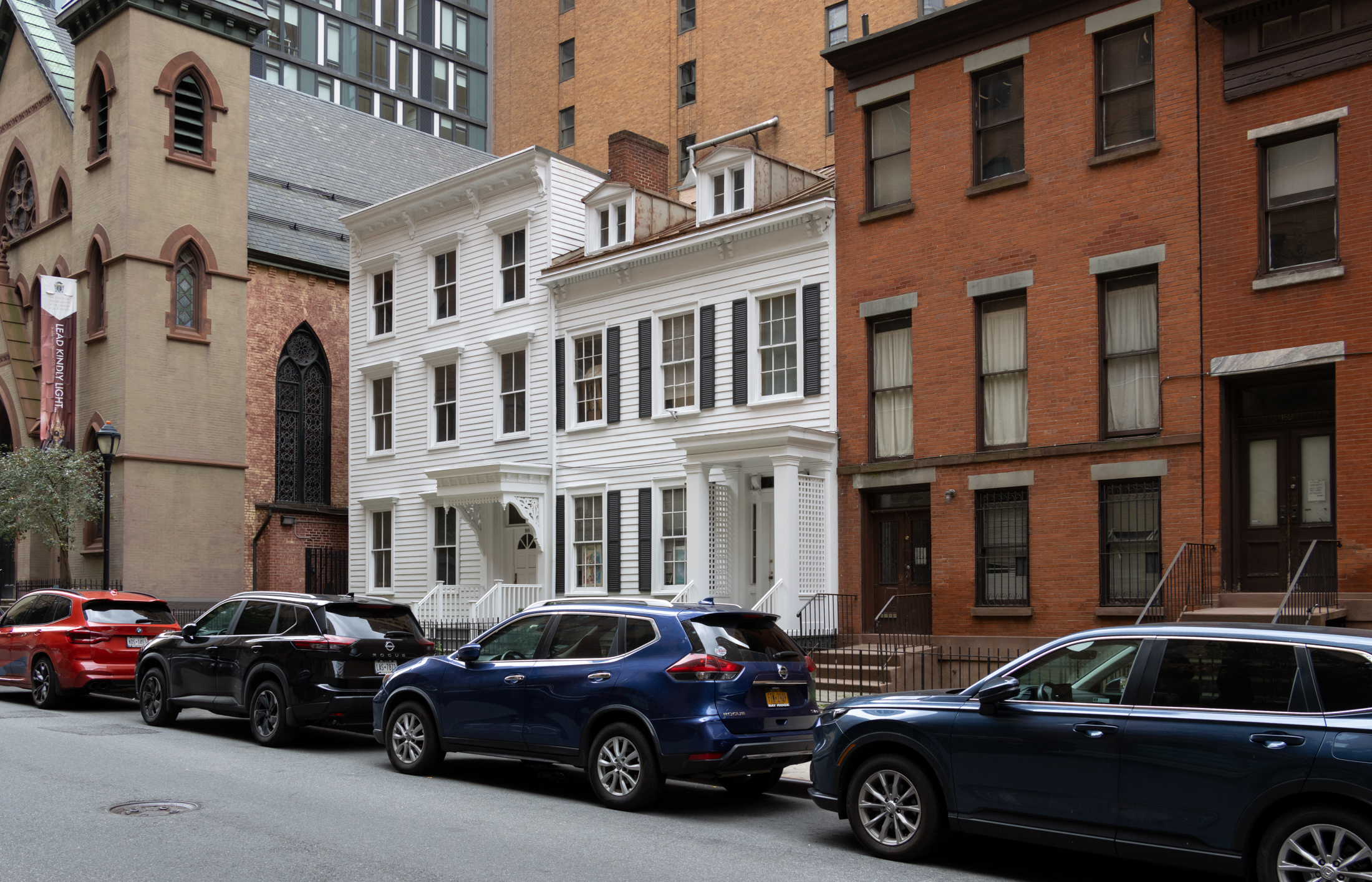 19th century wood frame and brick houses in a row