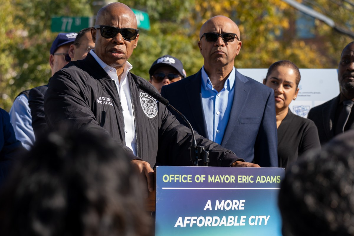 mayor adams at a podium