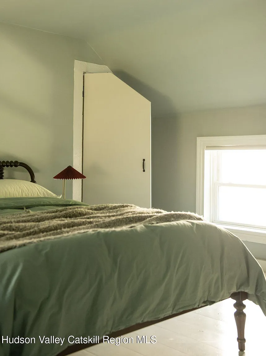bedroom with sloping ceiling