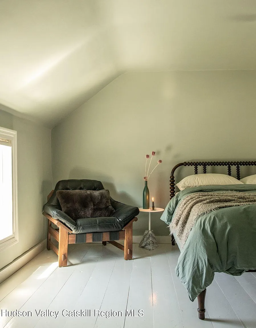 bedroom with floor painted gray