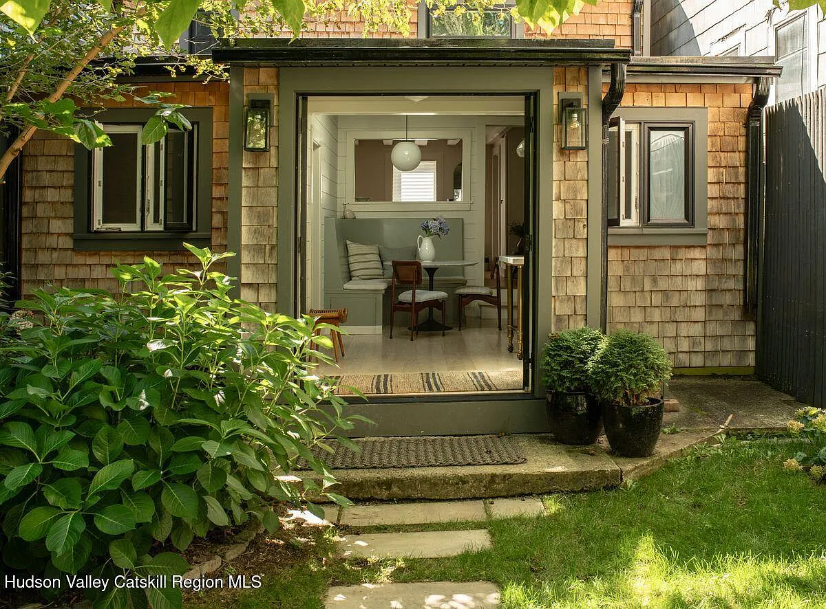 rear facade with french doors opening to the kitchen