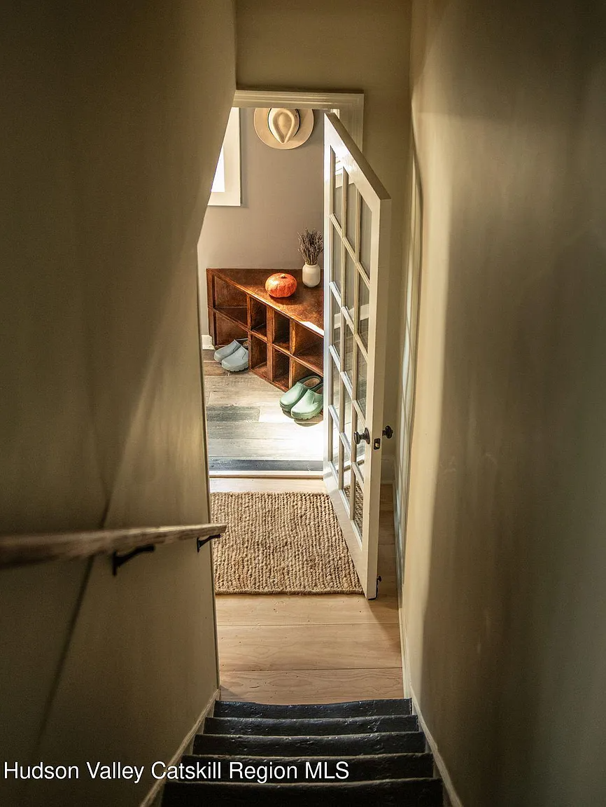 view down stairs to french door