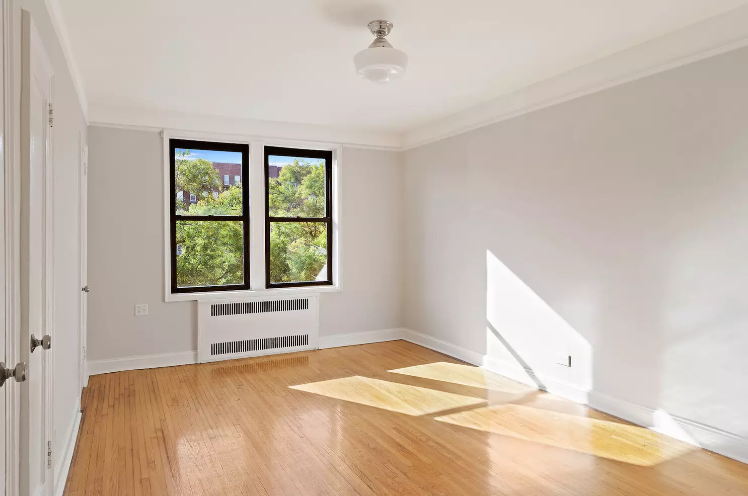 bedroom with wood floor