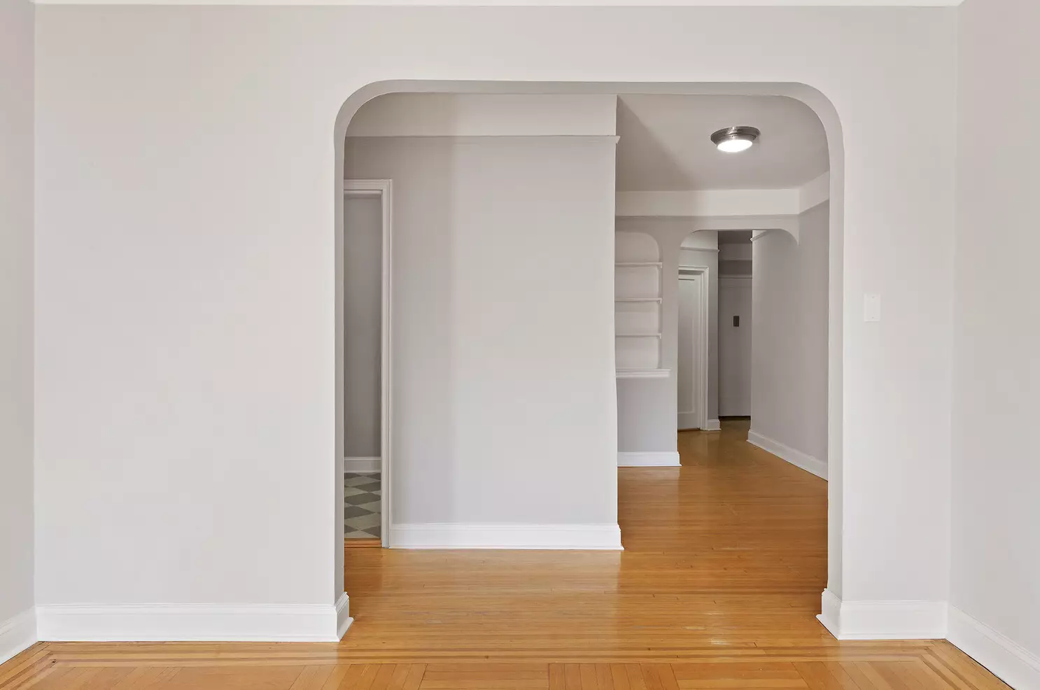 arched doorway to foyer