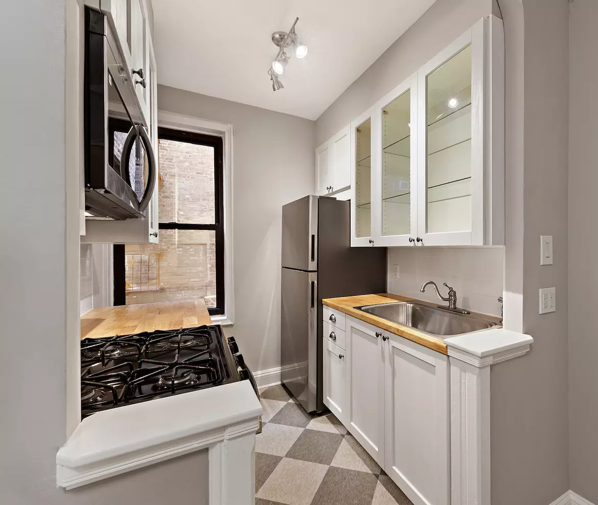 kitchen with white cabinets
