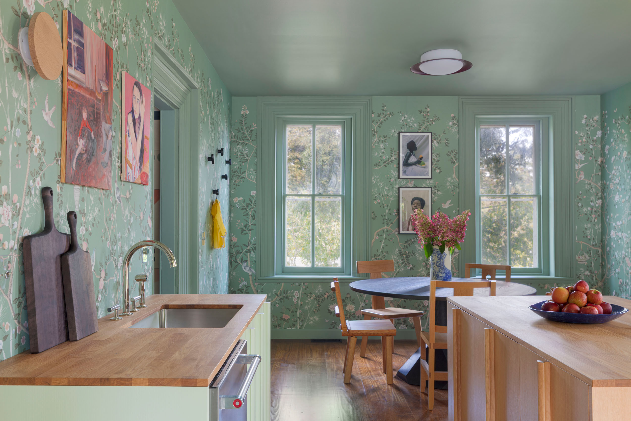 kitchen with green floral wallpaper