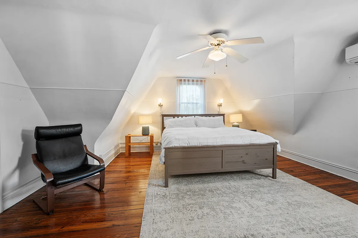 bedroom with wood floor, ceiling fan