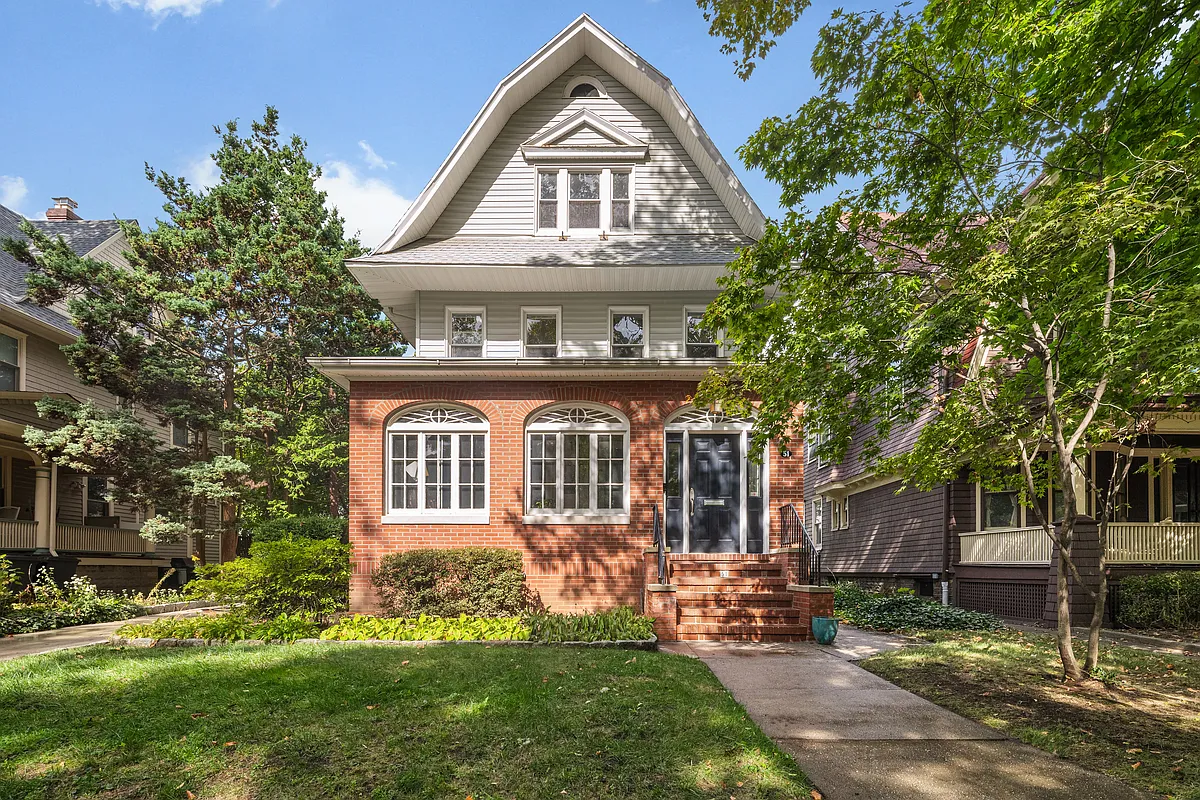 standalone house in Midwood Park with brick first floor