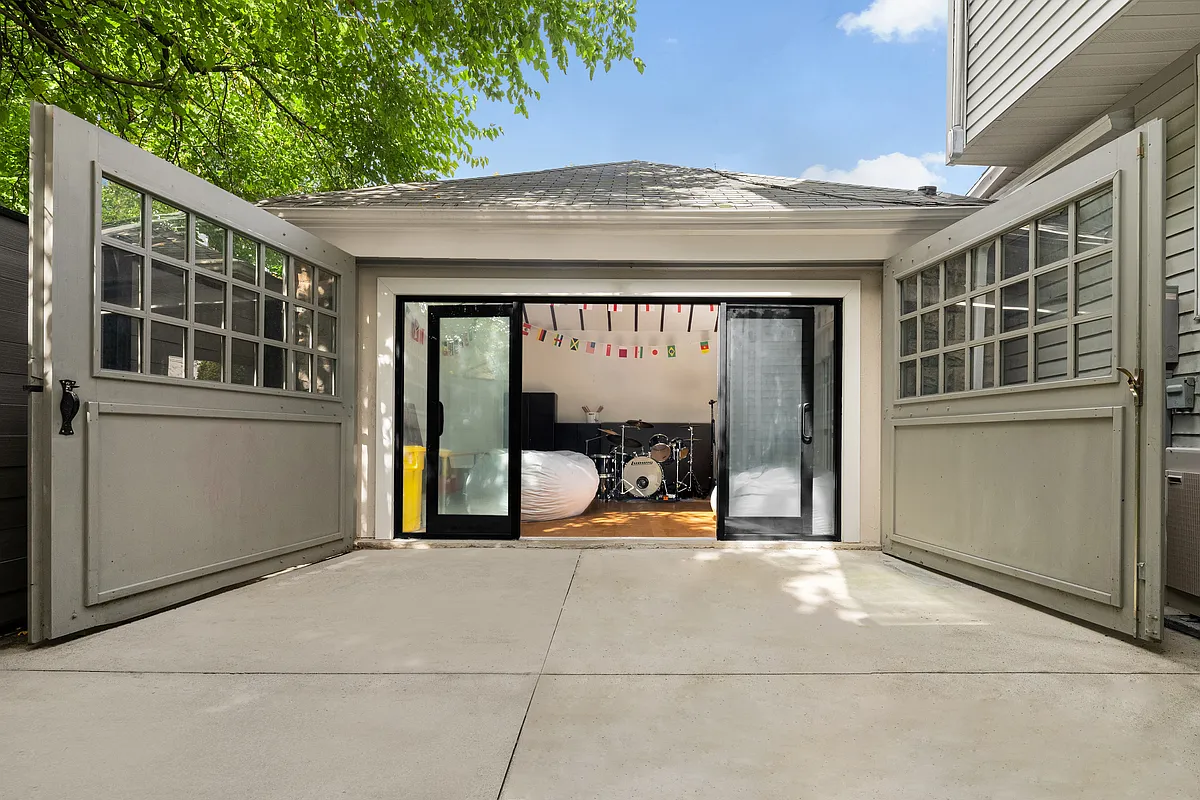 garage turned into a music studio space with sliding glass doors