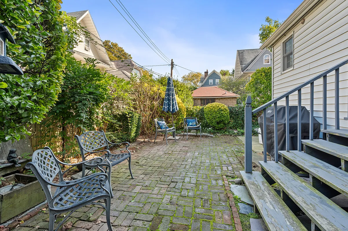 brick paved patio with room for dining