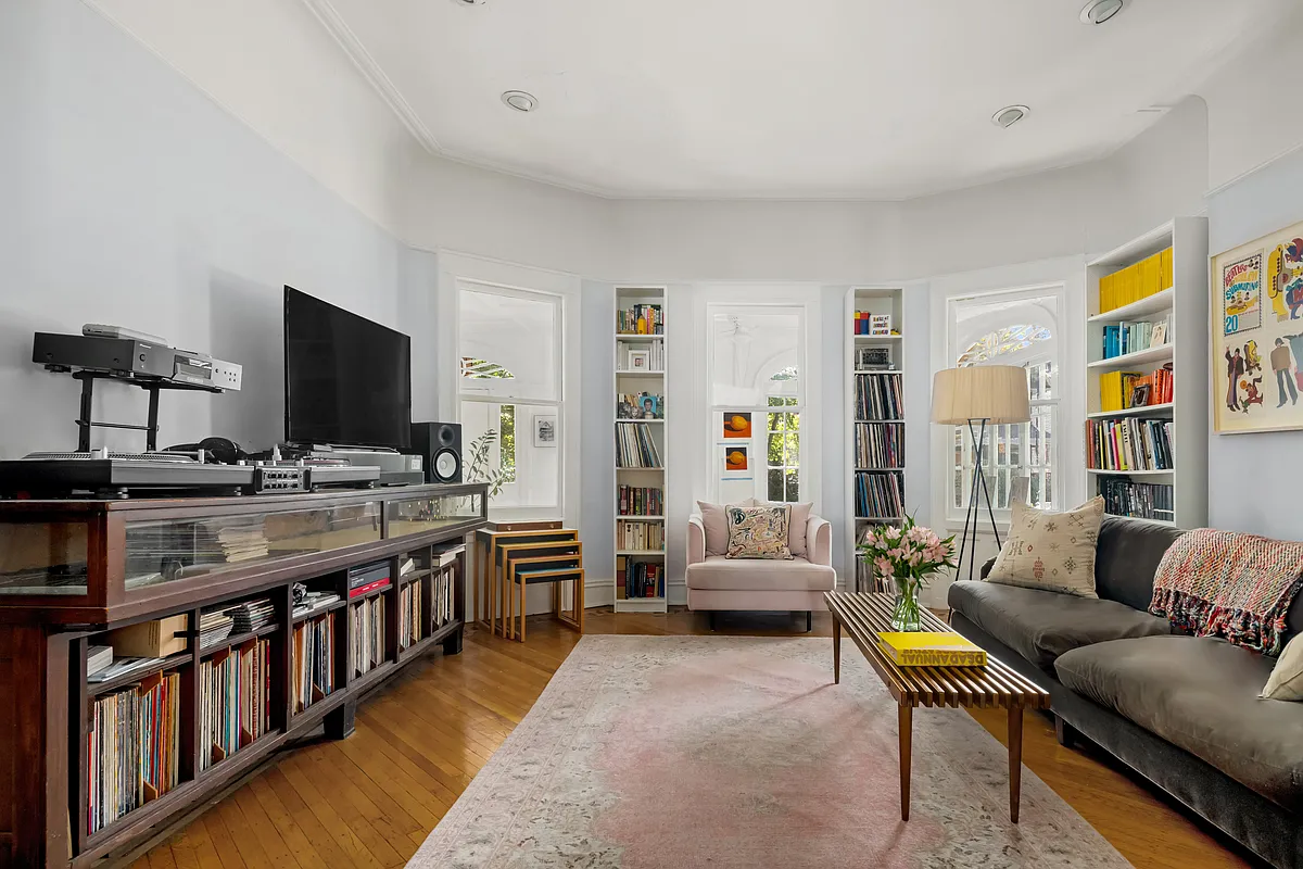 den with picture rail, wood floor