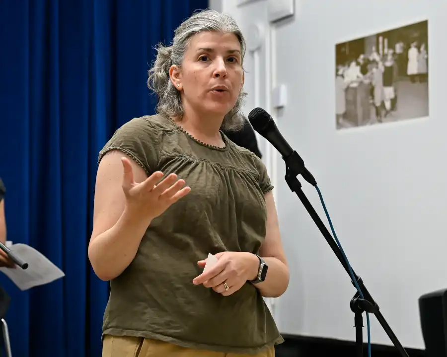 person at a microphone
