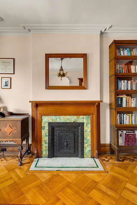 mantel with green tile surround