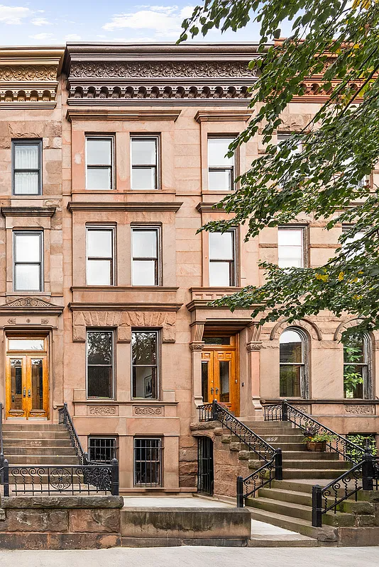 brownstone exterior with ornamental cornice