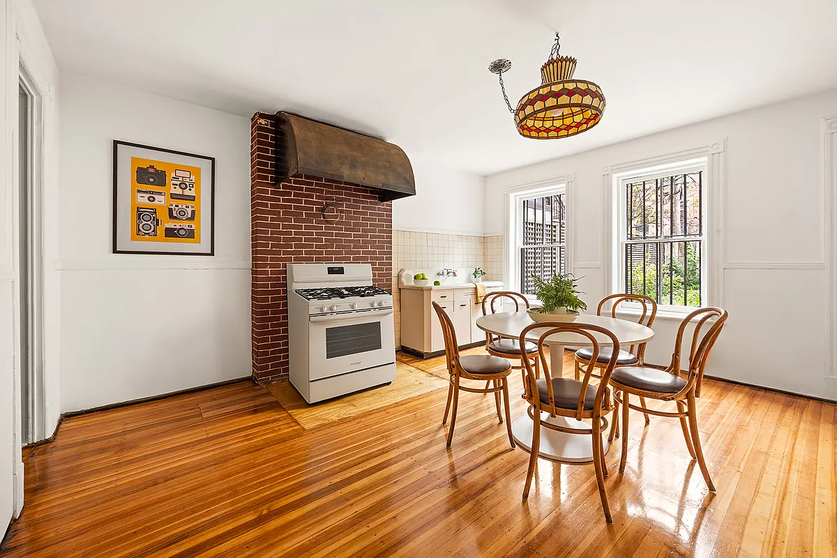 garden level kitchen with wood floor, vintage sink