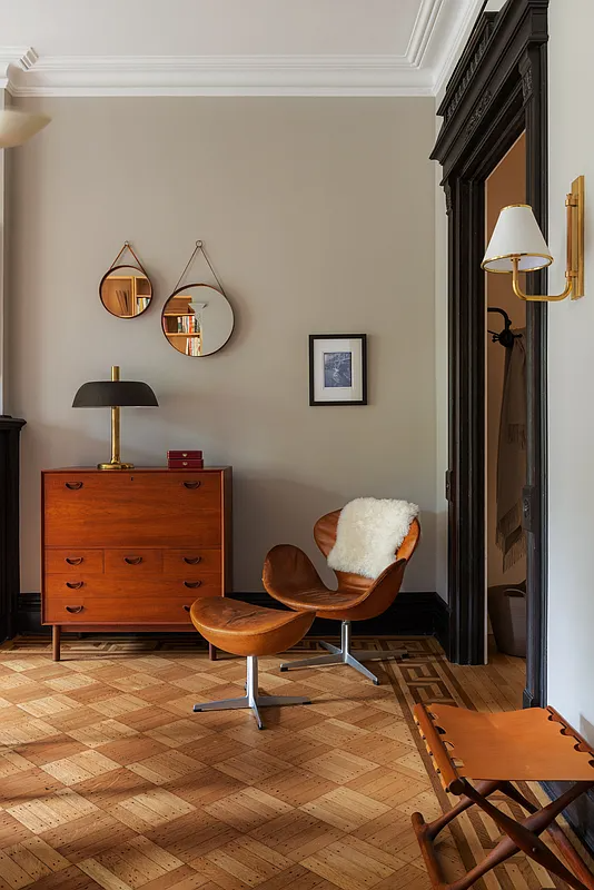 den with wood floor with inlaid border