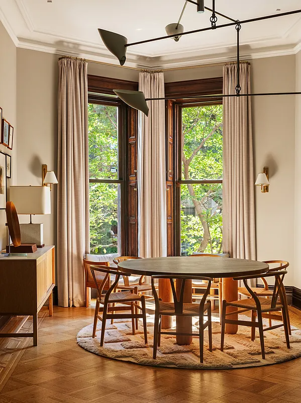 dining area in angled bay of the front parlor