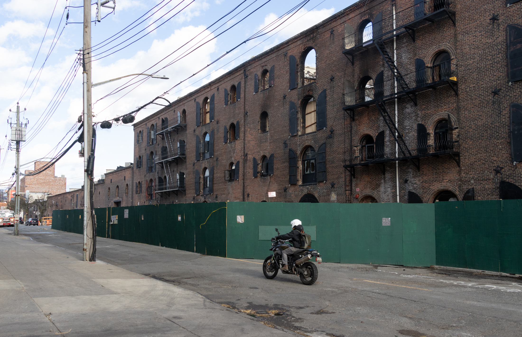 warehouse with construction fence 