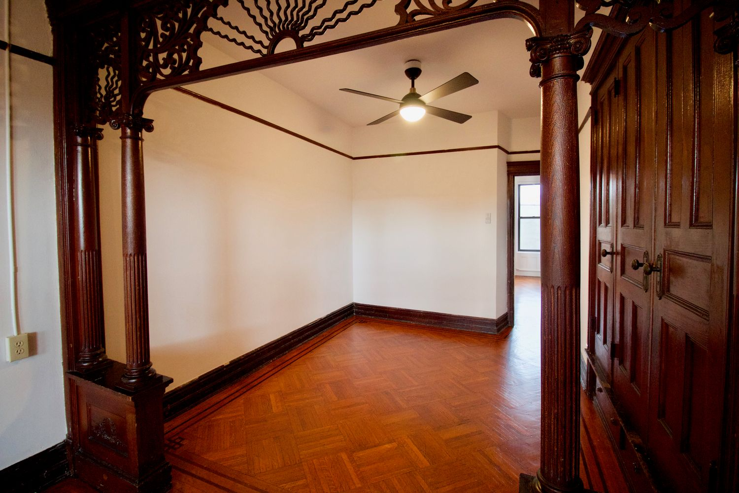 fretwork screen between front and middle parlors