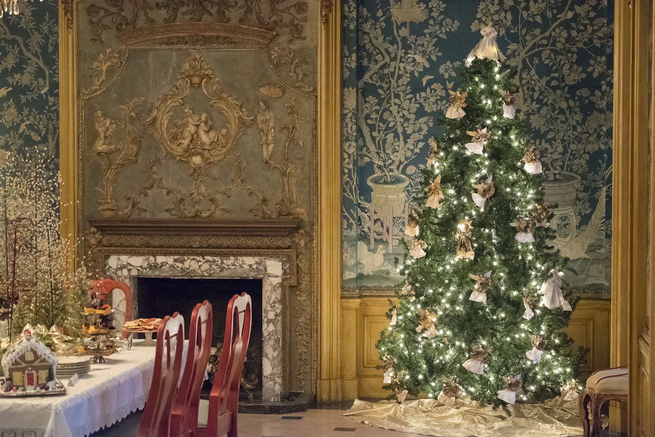 a christmas tree in a dining room
