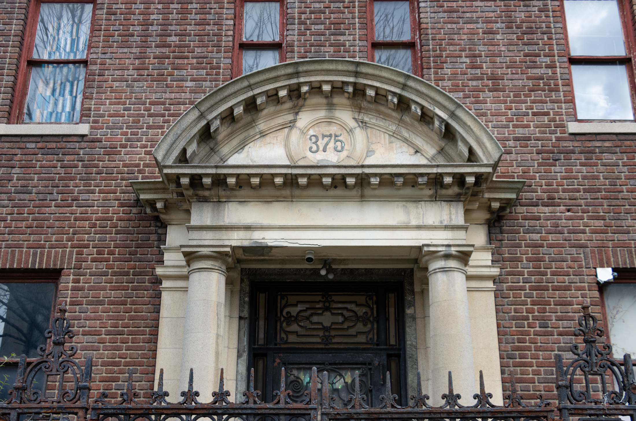 ornamental door surround with 375 signage
