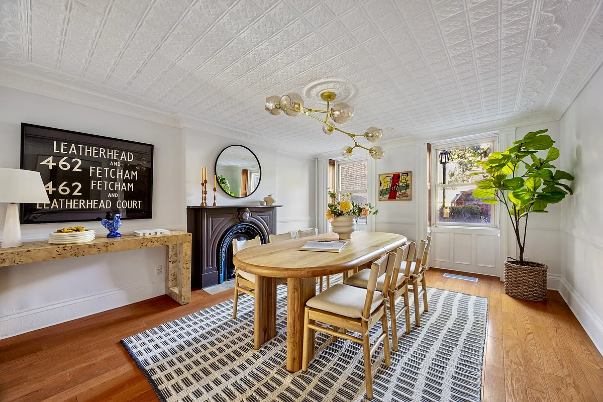 garden level dining room with tin ceiling