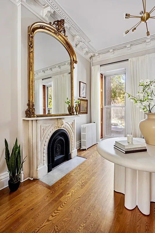 marble mantel with gold mirror